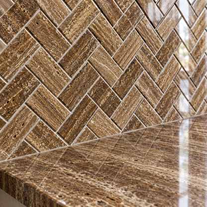 Brown Noce Travertine Herringbone Mosaic Tile 1x2, Polished & Vein-Cut - installed close-up